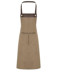 bib apron featuring a pocket and faux leather accents